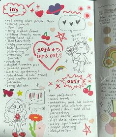 an open notebook with drawings and doodles on it