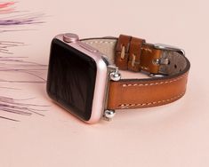 "Brown Leather Apple Watch Band 38mm 40mm 41mm 42mm 44mm 45mm, women Beaded iWatch Strap Bracelet for Series 7 6 5 4 3 2 1 & SE, iWatch Band ✽ DETAILS ✽ *Our Watch Band fits 155-200mm (6.1\" - 8.0\") wrists. *We can make a custom band with a different price. Please message us if you have a different wrist size. *Metal clasp/connector included 7 different color options for adapters (Silver, Gold, Rose Gold, Space Gray,Black,Blue & Red) Adapter color and buckle color will be same. ✽ PRODUC Rectangular Adjustable Watch Band As Gift, Rectangular Adjustable Watch Band For Gifts, Adjustable Rectangular Apple Watch Band With Bracelet Strap, Gift Rectangular Watch Band With Adjustable Band, Adjustable Bracelet Strap Apple Watch Band, Brown Bracelet Strap Apple Watch Band As Gift, Adjustable Bracelet Strap Apple Watch Band For Everyday, Trendy Brown Apple Watch Band As Gift, Trendy Brown Apple Watch Band For Gift