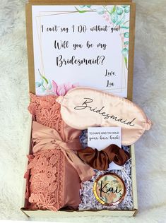 the bridesmaid gift box is filled with personalized items for her special day