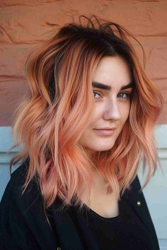 25 Peach Hair Colors That Will Make You Book a Salon Appointment in 2024 Bright Peach Hair, Peach Hair Dark Roots, Peach Pumpkin Hair, Peach Highlights Hair, Peach Brown Hair, Dark Peach Hair, Peach Colored Hair, Bold Hair Color Ideas, Copper Peach Hair