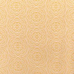 a yellow and white wallpaper with an intricate design on it's surface,