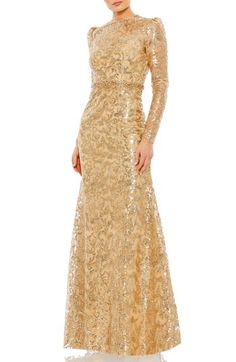 A twinkling tapestry elegantly informs this puff-shoulder trumpet gown that makes a striking impression. 61" length (size 8) Jewel neck Long sleeves Partially lined 100% polyester Spot clean Imported Asian Owned/Founded Formal Wedding Guest Dress, Gown Gold, Sleeve Gown, Trumpet Gown, Dresses Quinceanera, Long Sleeve Evening Dresses, Formal Dresses Gowns, Long Sleeve Gown, Column Gown