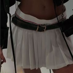 After Miu Miu's Much-Talked About Spring '22 Collection That Disrupted Office Dress Codes, This Season Miuccia Set Her Sights On The Tennis Court With A Collection That's Y2k-Meets-Preppyand Still Sates Our Desire To Show Off Ample Skin. This Ultra-Mini Skirt Has A Classic A-Line Cut Tailored From Pleated Sable With A Ribbed Waistband Designed To Hang Low On The Hips. Brand New With Tags. It 36 Fits Size 00/0 Xs Us 0-2 Miu Miu Pleated Skirt, Beige Pleated Skirt Outfit, Beige Pleated Skirt, White Pleated Mini Skirt, Miu Miu Skirt, Office Dress Code, Skirt Aesthetic, Pleated Skirt Outfit, Office Dress