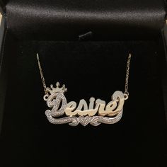 Get the perfect accessory for your little princess with our Gold 3D Princess Crown Nameplate Necklace! This beautiful piece is crafted from genuine gold and features a delicate 3D crown design that will make her feel like royalty. With a nameplate for personalization, it's a special and unique keepsake she'll treasure forever. It's suitable for girls of all ages and makes a great addition to any jewelry collection. Encourage her to feel like a princess every day with this stunning necklace Specs: Dimension: Up to 1.70 inches wide by 0.75 inches height. Total length depends on number of letter Stones: Option to choose between genuine Diamond or Cubic Zirconia from drop down box above. Gold Hallmarked Nameplate Necklace, Custom Name Gold Plated Nameplate Necklace, Luxury Custom Name Necklace In Nameplate Shape, Gold-plated Name Necklace As Gift, Gold Name Plate Necklace Crown, 3d Princess, Name Rings Silver, 3d Crown, Crown Necklace