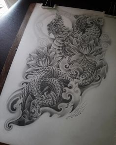 a drawing of a dragon and flowers on paper