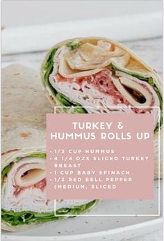 a turkey and hummus roll on a plate with text overlay that reads, turkey and hummus rolls up