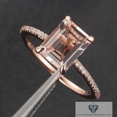 an image of a ring with diamonds on it