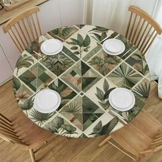 the table is set with plates and placemats for two people to eat at