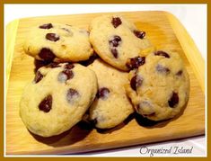 chocolate chip cookies on a wooden cutting board