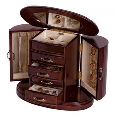 an open wooden jewelry box with drawers