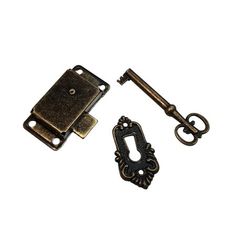 an antique door latch and key on a white background