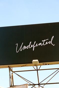 a large sign with the word undiffated written on it's back side