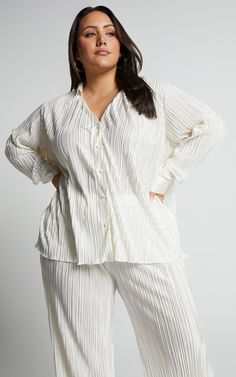 Beca Shirt - Plisse Button Up Shirt in Cream | Showpo USA Elegant Button-up Tops For Loungewear, Chic Relaxed Fit Off White Top, Chic Cream Shirt With Relaxed Fit, Elegant White Blouse For Loungewear, Chic Cream Button-up Top, Long Sleeve Cream Blouse For Loungewear, Cream Long Sleeve Blouse For Loungewear, Trendy Cream Button-up Tops, Chic Blouse With Button Closure For Loungewear