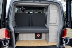 the back end of a van with seats in it