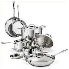 an assortment of stainless steel pots and pans