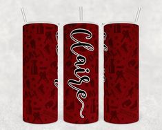 two red canisters with the word love written on them in white ink and black lettering