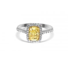 a yellow and white diamond ring