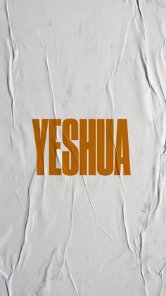 the word yeshuaa is written in orange on a white background with crumpled paper