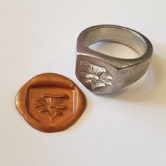 This signet ring is cast in lead-free pewter. The ring size when cast is 5.25, 7.25, 9. The sealing image is an oyster mushroom bunch.       This is part of a series of signet rings I am making cast from lead-free pewter. Each master ring is hand sculpted to give a unique, rustic style, multi-dimensional relief image when used as a stamp to seal, with sealing wax. Tree Signet Ring, Cool Rings For Men Unique, Wax Cast Ring, Wax Cast Rings, Signet Ring Design, Silver Ring Ideas, Mens Signet Rings, Ring Casting, Wax Casting Jewelry