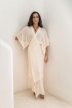 Juliette is our coziest dress and cover up You have up to 3 ways to close it and it is what make this dress perfect for your beach days The tie dye versions are subject to variations as are hand dyed 100% natural cotton White Bohemian Wrap Dress, White Flowy Maxi Dress For Loungewear, White Wrap Beach Dress, White Wrap Dress For Beach, Summer Cotton Gauze Loungewear Dress, Summer Cotton Gauze Lounge Dress, V-neck Maxi Dress With Natural Dye For Summer, Summer Cotton Gauze Dress For Loungewear, Cream Linen Beach Dress