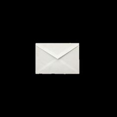 an open envelope on a black background