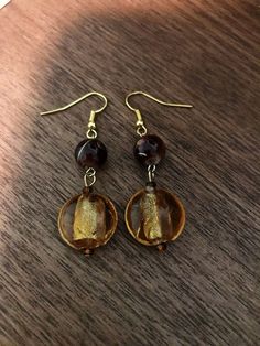 Yellow gold glass bead earrings with brown and gold accent bead