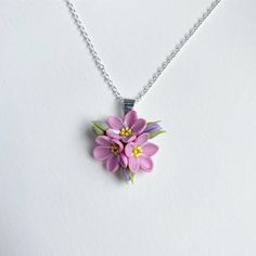 This flower pendant are fully handmade. Each element petal is made entirely by hands from material called cold porcelain and toned with soft pastel. These flowers look much like fresh flowers but they will never fade.  Size of composition - length - 0.8 inches 2 cm)                                         width - 0,8 inches (2 cm)    This pendant is perfect for woodland, greenery or rustic weddings and other celebrations. But also they will be good even as casual accessory. Flowers are tender and delicate.  Care: You should treat with care this product. If it is dirty, do not worry. Just wipe with a slightly damp cloth. Delivery: All products are securely packed in special containers to avoid any damage during delivery. You will get your flower accessory in nice gift box. Also I will gladl Pink Flower Pendant Necklace For Spring, Delicate Pink Flower Pendant Jewelry, White Flower Boutonniere, Valentine's Day Pink Flower Pendant Necklace, Pink Sterling Silver Flower Pendant Necklace, Pink Adjustable Flower Pendant Necklace, Pink Pendant, Jewelry Delicate, Delicate Pendant