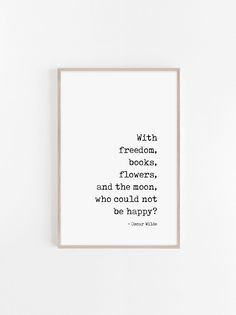 a framed print with the quote, with freedom books flowers and the moon who could not be happy?