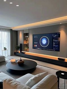 a large flat screen tv mounted to the side of a wall in a living room