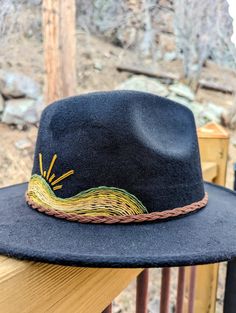 "Up your fashion game this spring with this addition to your closet. This gorgeous bohemian style wide-brim felt hat with a hand-embroidered mountains and sun scene. Eclectic, boho and modern style all in one! A wonderful item to add to your closet for any woman who likes to stand out and make a statement with her fashion. Adjustable ❁ Fashionable ❁ One Size Fits Most ❁ Sun Protection ❁ Statement Piece ❁ Hand Embroidered  This is a beautiful one-of-a-kind, hand stitched statement fashion piece - no two designs are alike. Each hat I make is carefully curated, designed and hand-embroidered. I am very inspired by vintage, 60s and 70s fashion and love to design embroidery pieces that I would love to wear. I am dedicated to making you satisfied with you purchase. Please message me for custom re Bohemian Style Flat Brim Felt Hat For Outdoor, Bohemian Short Brim Felt Hat For Outdoor, Bohemian Flat Brim Felt Hat For Outdoor, Bohemian Fedora Felt Hat For Outdoor, Bohemian Felt Hat With Curved Brim For Outdoor, Spring Outdoor Wide Brim Felt Hat, Bohemian Hats For Outdoor Fall Activities, Bohemian Hats For Outdoor Fall, Bohemian Hats For Fall Outdoor Use