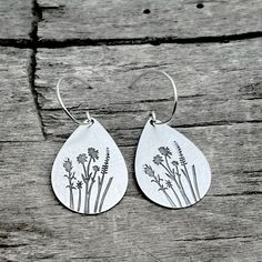 Ever imagine yourself running in a field of flowers or having a cute picnic there? Your love of simple beauty that comes from spring when flowers cover the hillsides or that lovely bouquet you get at the farmers markets. You can know have the flowers that will never die with these earrings featuring Indian Paintbrush, Wild Lupine, and Balsamroot. The wildflowers of the Rocky Mountains represent the gentle transition of seasons, from Winter to Spring, flowers are the signs of new beginnings and c Running In A Field, Wild Lupine, Cute Picnic, A Field Of Flowers, Indian Paintbrush, Winter To Spring, Field Of Flowers, The Rocky Mountains, Farmers Markets