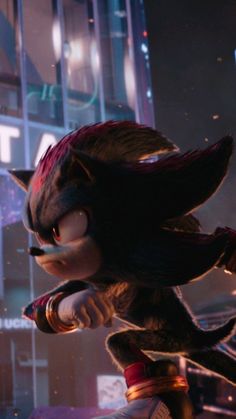 sonic the hedgehog is standing in front of a tall building