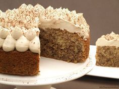 two slices of carrot cake with white frosting