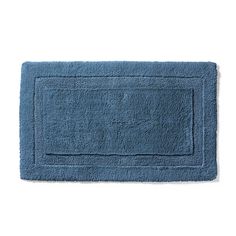 a blue bath mat on a white background with the word's name written in it