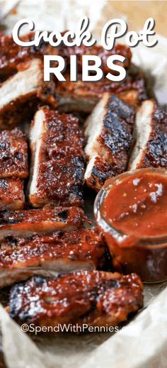 barbecue ribs with bbq sauce on top and the words crock pot ribs above it