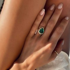 Luxury Pear-shaped Rings With Pave Setting, Pear-shaped Diamond Ring With Gemstone, Green Teardrop Diamond Ring, Pear-shaped Diamond Jewelry, Teardrop Cubic Zirconia Jewelry For Proposal, Luxury Teardrop Halo Setting Ring, Luxury Teardrop Rings With Halo Setting, Teardrop Diamond White Jewelry For Proposal, Diamond White Teardrop Jewelry For Proposal