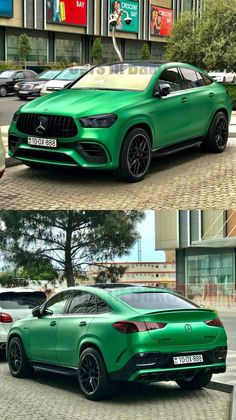 the green mercedes suv is parked on the side of the road in front of some buildings