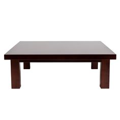 a wooden table sitting on top of a white floor