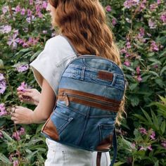 Myra Bag Janesa Denim Backpack Bag Nwt An Old Pair Of Jeans Comes Back To Life In The Super Cute Denim Backpack From Myra Bag. Awesome For Back To School, Your Next Travel Excursion, Festivals Or Everyday. Medium To Light Wash Blue Denim With Fading Tan Leather Accents Zip Front Pocket Zip Top Closure Leather And Denim Combo Adjustable Straps Tab Handle Lined Interior With Zipper And Slip Pockets Width 12.5 Depth 4 Height 15 Handle Drop 3.5 Nwt Boho, Bohemain, Festival, Western, Blue Jeans, Hippie, 70's, Retro, Light Academia, Preppy, Balletcore, Nerdy, School Girl, Classic, Timeless, Preppy, Intellectual, Sophisticated, Elegant, Refined, Nostalgic, Collegiate, Academic, Literary, Cozy, Mochila Jeans, Concealed Carry Bags, Leather And Denim, Boho Backpack, Denim Backpack, Retro Light, Convertible Crossbody Bag, Flap Backpack, Patterned Backpack