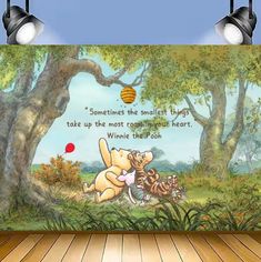 winnie the pooh wall mural in a children's room with two spotlight lights