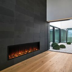 a modern fireplace in the middle of a room