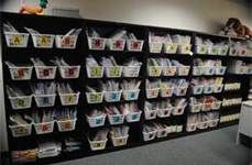 a room filled with lots of plastic bins