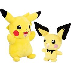 two stuffed animals that look like pikachu and pokeball are standing next to each other