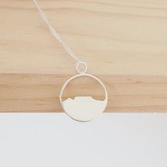 table mountain necklace / round mountain pendant / Cape Town South Africa / silver Africa jewelry Unique Silver Circular Necklace, Cape Town Africa, Wooden Mountain Necklace, Africa Jewelry, Mountain Necklace Silver, Mountain Pendant, Silver Moon-shaped Necklaces For Meditation, Africa Necklace, Mirror Jewelry Armoire