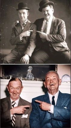 two men in suits and ties are posing for the camera, one is pointing at something