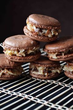 chocolate macaroni and cheese sandwich cookies on a cooling rack, ready to be eaten