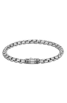 This slim box-chain bracelet in durable sterling silver makes a subtle everyday accessory. 1/4" widest band width Push-clasp closure Sterling silver Imported Classic Polished Chain Link Bracelets, Classic Sterling Silver Bracelet With Silver Chain, Classic Sterling Silver Jewelry With Rectangular Links, Classic Bracelets With Rectangular Silver Chain Links, Classic Engraved Oval Link Chain Bracelet, Classic Engraved White Gold Chain Bracelet, Classic Box Chain Link Bracelets, Classic Adjustable Bracelets With Rectangular Links, Classic Sterling Silver Oval Link Chain Bracelet