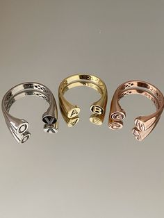 DOUBLE LETTER RING Material: High Quality Solid 925 Sterling Silver Finish: Sterling Silver / Gold / Rose Gold ♡ The most unique jewelry you can find, perfect gift for you and your loved one. ♡ All of our jewelry is handcrafted with enthusiasm and great care in our workshop. ► HOW TO ORDER * Please use the 'PERSONALIZATION BOX' to let us know the required information. * Written in uppercase letters only. ► HOW TO CARE FOR YOUR JEWELRY * Maintain your jewelry's high shine by avoiding contact with Adjustable White Gold Initial Open Ring, Polished Finish Initial Ring For Promise, Initial Open Ring With Polished Finish For Promise, Promise Initial Open Ring With Polished Finish, Sterling Silver Initial Ring With Hallmarks, Rose Gold Sterling Silver Open Signet Ring, Rose Gold Open Signet Ring In Sterling Silver, Symbolic Initial Open Ring For Anniversary, Symbolic Anniversary Initial Open Ring