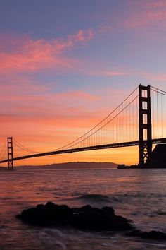 the golden gate bridge in san francisco at sunset