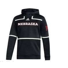 Show Your Support For The Nebraska Cornhuskers With This Stylish Adidas Pullover Hoodie. The Black Sweatshirt Features The Team's Colors And Emblem, Making It Perfect For Game Day Or Everyday Wear. Available In Size Small, It's A Great Gift For Any Cornhusker Fan. Made By Adidas, A Trusted Brand In Sports Apparel, This Hoodie Is Sure To Be Comfortable And Durable, And Will Keep You Warm During Those Chilly Autumn Games. Whether You're Cheering On The Home Team Or Just Running Errands, This Nebra Black Varsity Sweatshirt With Team Name, Sports Team Hoodie In Black, Black Sports Hoodie With Team Name, Black Collegiate Sweatshirt For Sports Season, Black Team Spirit Sports Hoodie, Black Team Spirit Hoodie For Sports, Black Sports Team Spirit Hoodie, Black Sports Hoodie With Team Spirit, University Red Sporty Sweatshirt For Game Day